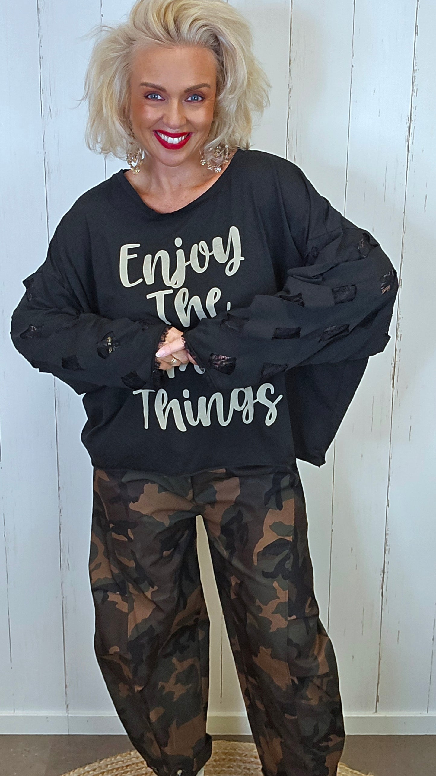 Livia oversized topp med blondeermer svart