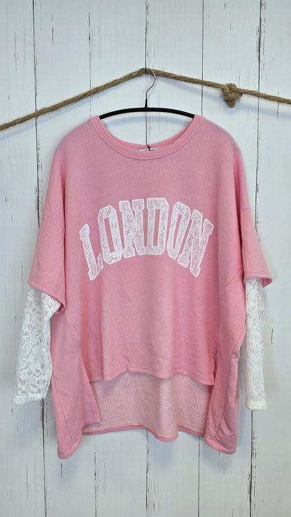 Birka oversized topp rosa/hvit