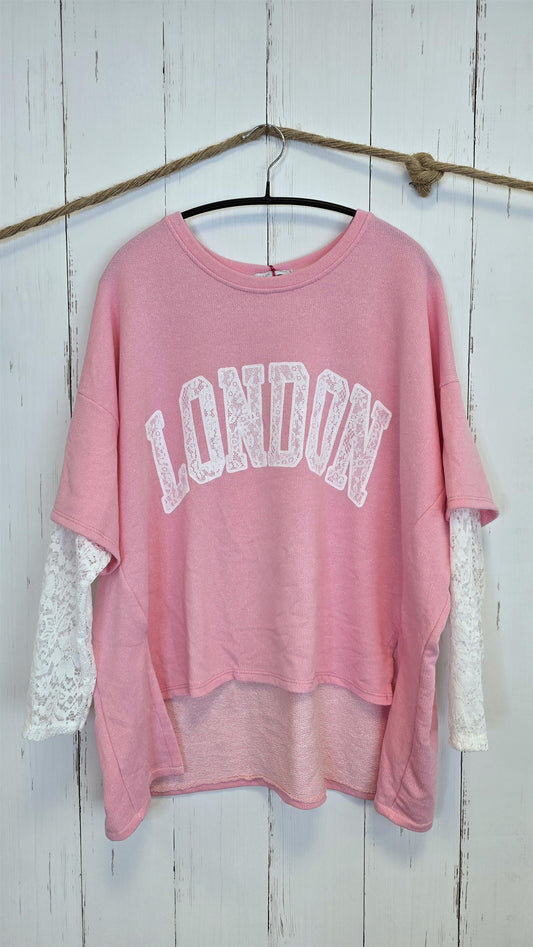 Birka oversized topp rosa/hvit
