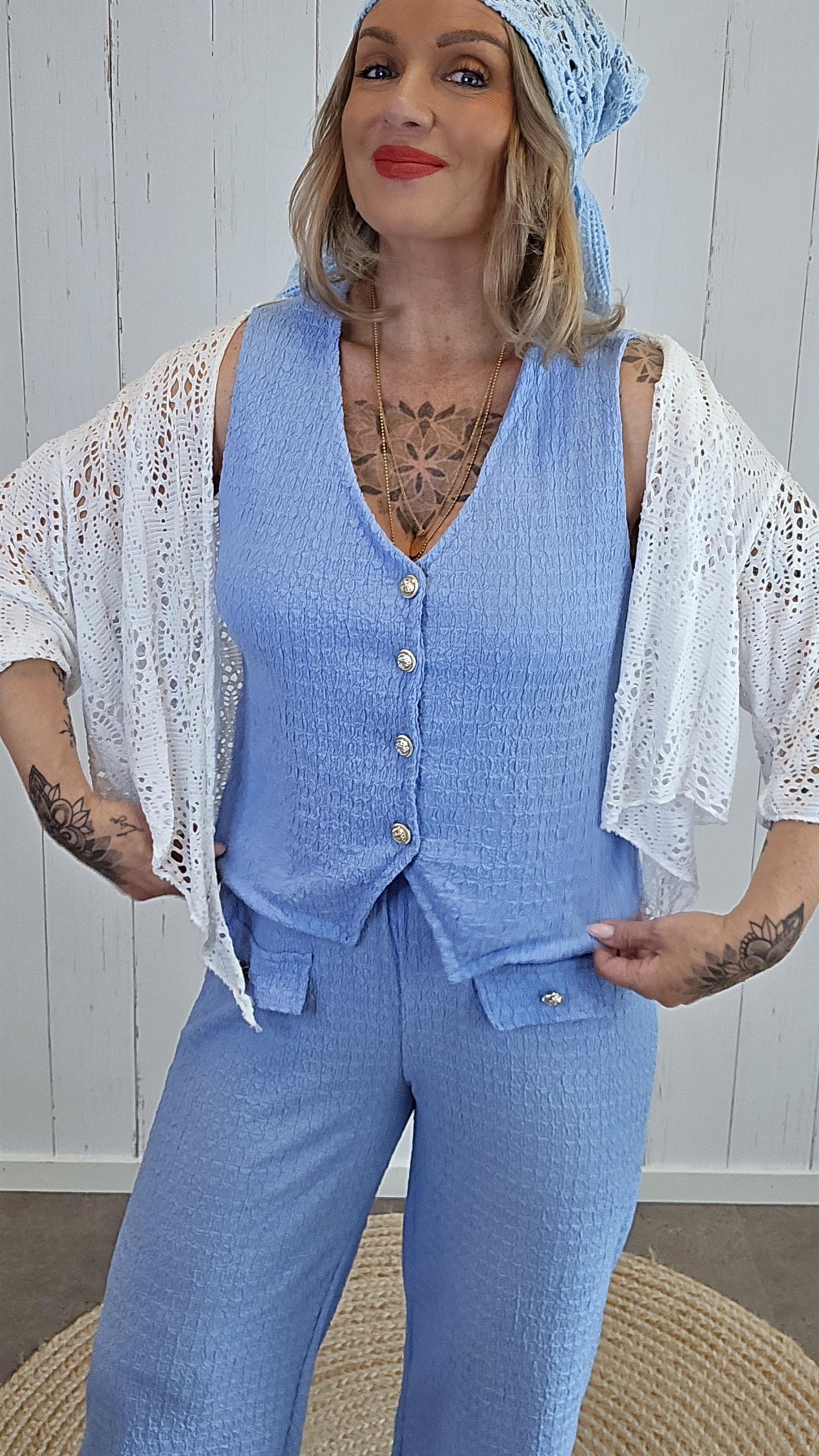 Stella strukturvest med gullknapper