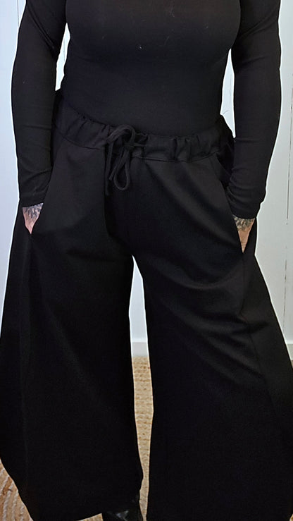 Siv baggybukse svart