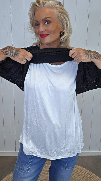 Strikket topp med Innersinglet svart