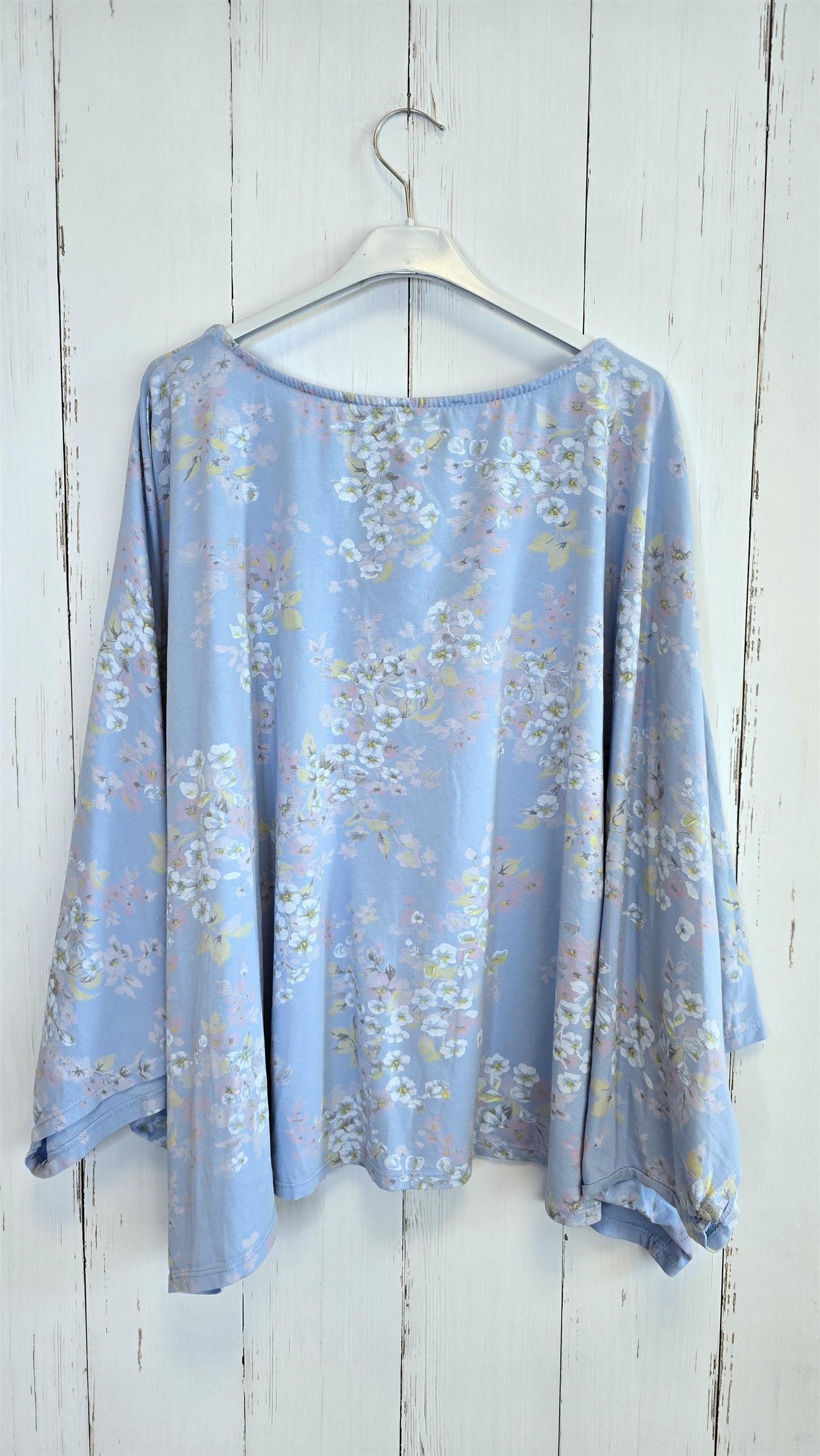 Blomstret poncho-topp blå