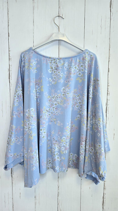 Blomstret poncho-topp blå