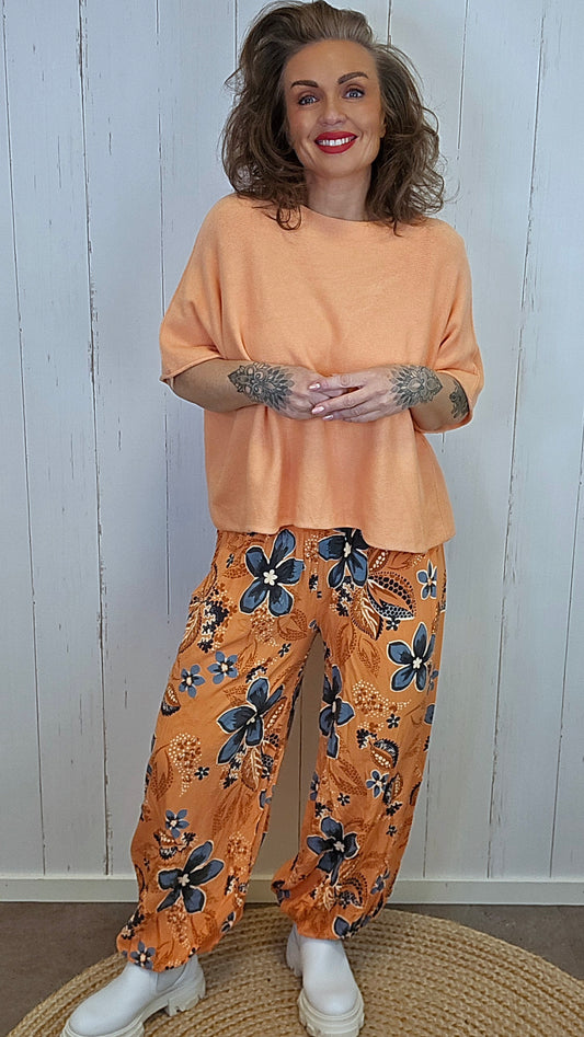 Henriette bukse med print orange