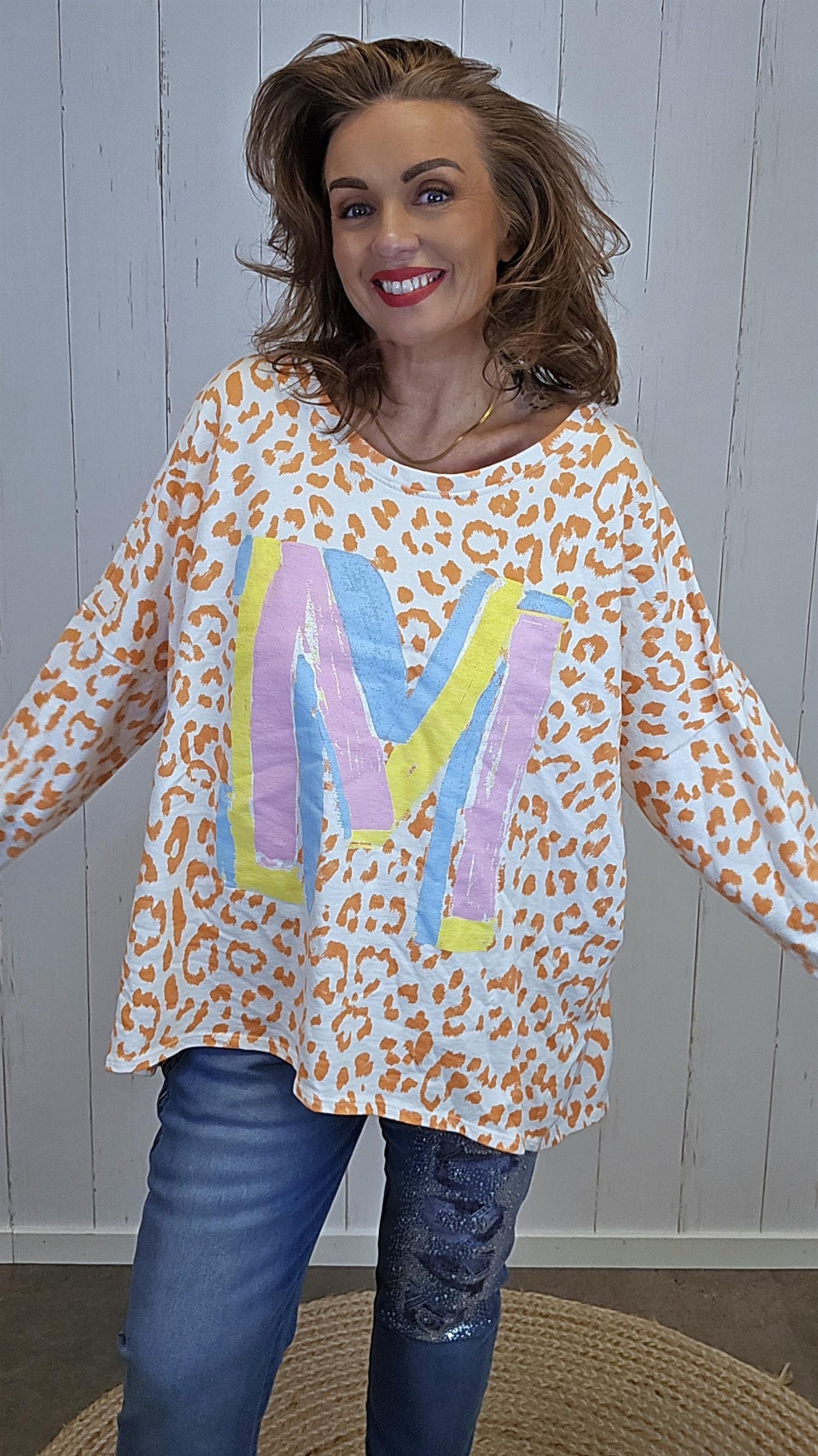 Celine bomullstopp oransje leo