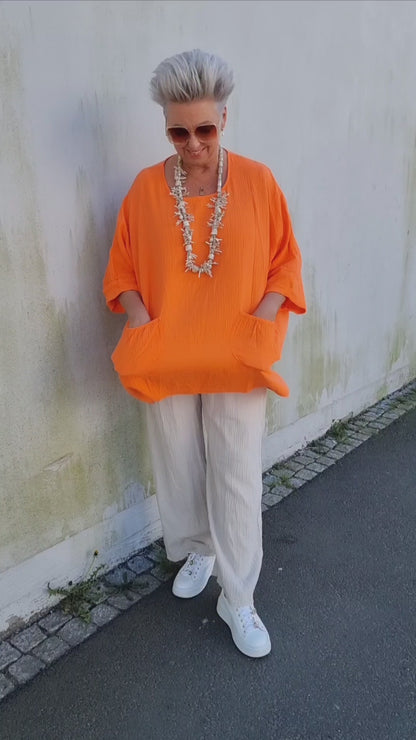 Ina vaffled topp med lommer orange
